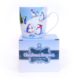 Christmas Penguin Mug by Jan Pashley